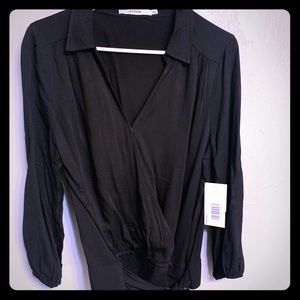 Long sleeve blouse, with tie waist. Never worn